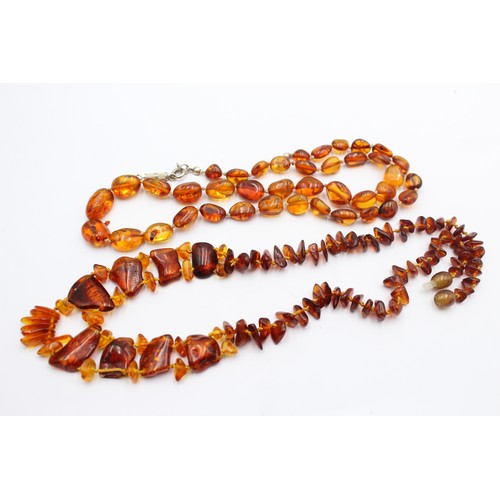 594 - 2 x amber bead necklaces including screw clasp (39g)