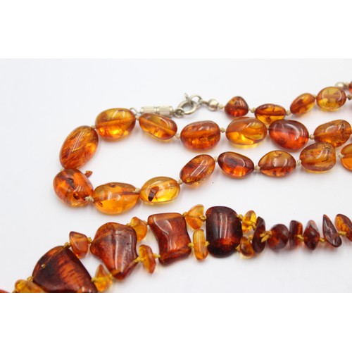 594 - 2 x amber bead necklaces including screw clasp (39g)