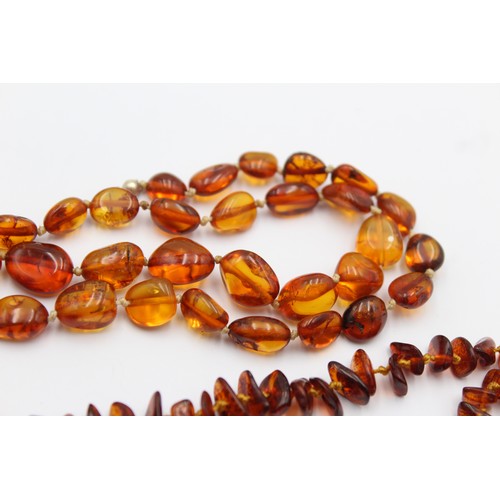 594 - 2 x amber bead necklaces including screw clasp (39g)