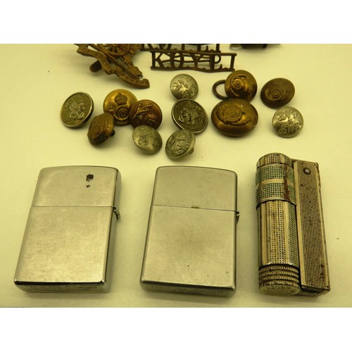 104 - MILITARY CAP BADGES, BUTTONS AND VINTAGE LIGHTERS INCLUDING ZIPPO'S