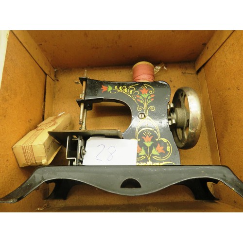 58 - ANTIQUE CHILDRENS SEWING MACHINE WITH ORNATE WOODEN SEWING BOX AND CONTENTS