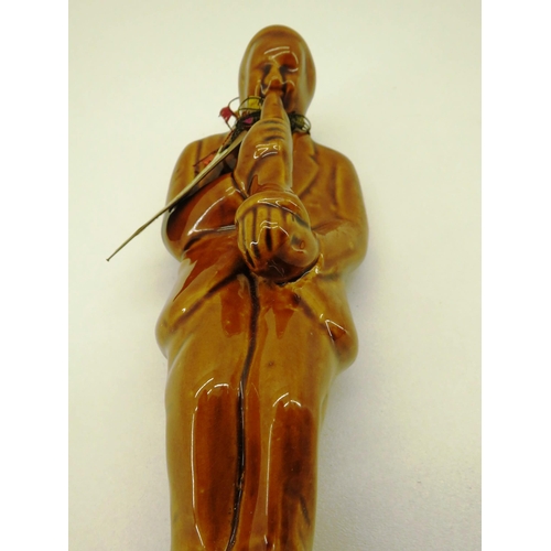 73 - 1970'S BROWN GLAZED SAXOPHONIST FIGURE