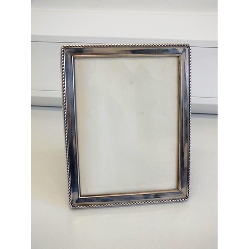 121 - STERLING SILVER PHOTO FRAME 18cm x 14cm, weight 274g