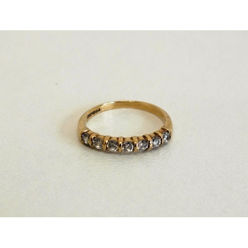 216 - 9CT GOLD RING - SEVEN CZ STONES - SIZE L, 1.7G