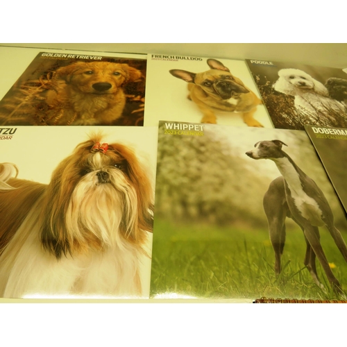 385 - SELECTION OF 2023 DOG CALENDARS