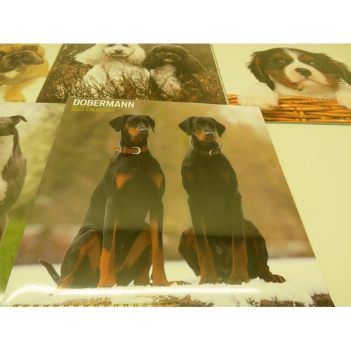 385 - SELECTION OF 2023 DOG CALENDARS