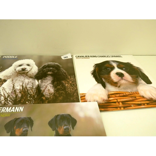 385 - SELECTION OF 2023 DOG CALENDARS