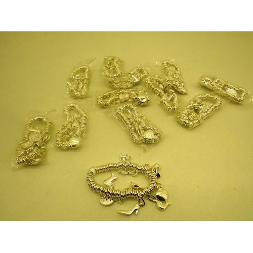 194 - 12 x WHITE METAL CHARM BRACELETS