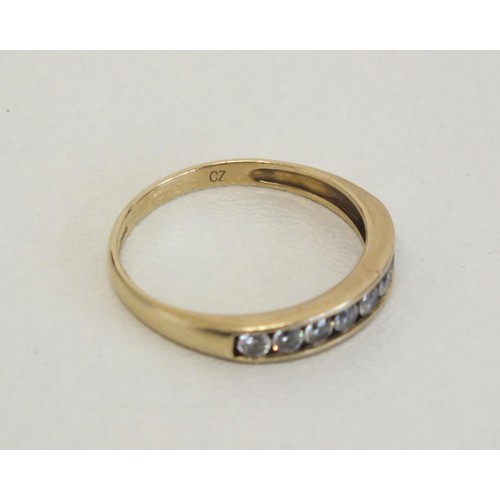 302 - LADIES 9CT GOLD NINE STONE RING