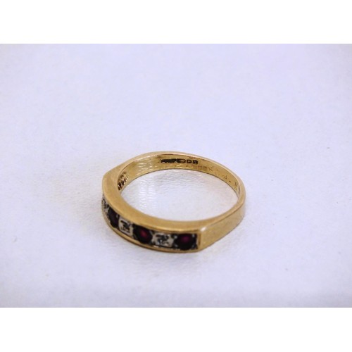 303 - LADIES 9CT GOLD SEVEN STONE RING