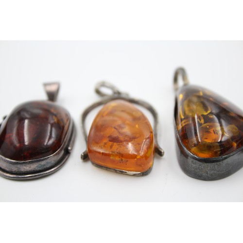 410 - 4 X .925 Amber Pendants