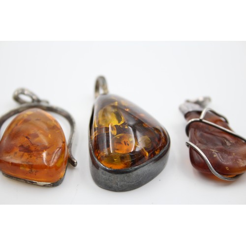 410 - 4 X .925 Amber Pendants