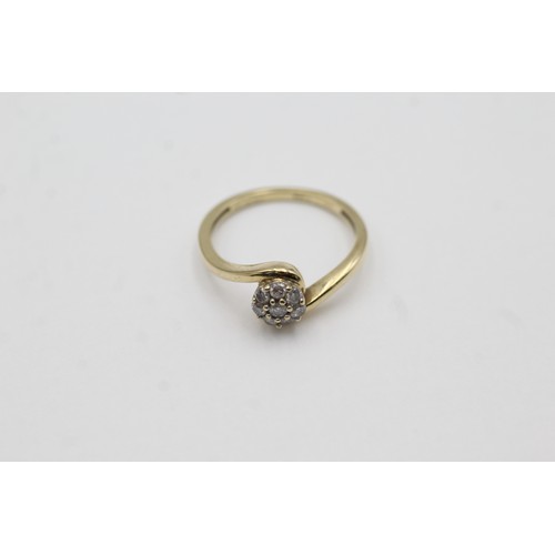 424 - 9ct gold diamond halo ring (2g)- SIZE O