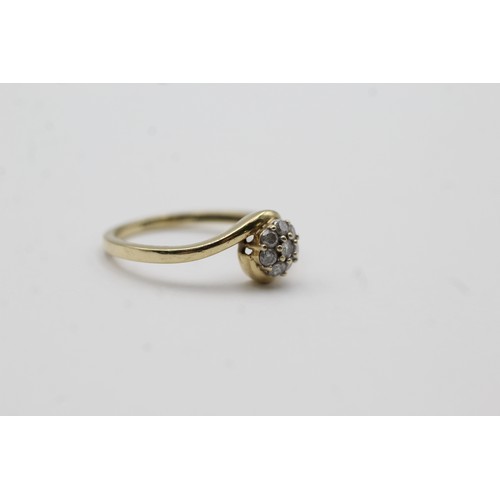 424 - 9ct gold diamond halo ring (2g)- SIZE O