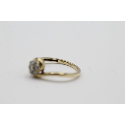 424 - 9ct gold diamond halo ring (2g)- SIZE O