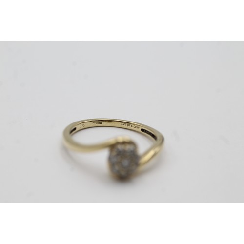 424 - 9ct gold diamond halo ring (2g)- SIZE O