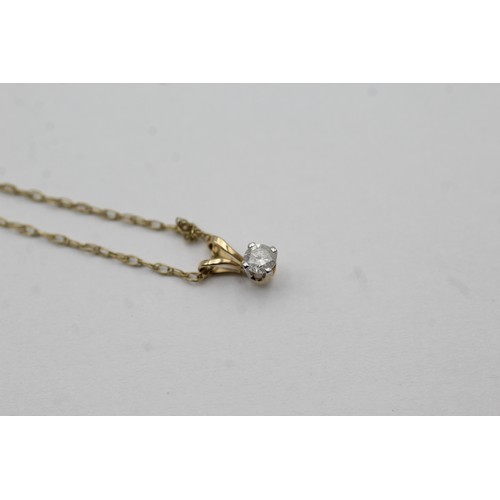 448 - 9ct gold round brilliant cut diamond pendant necklace (0.7g)