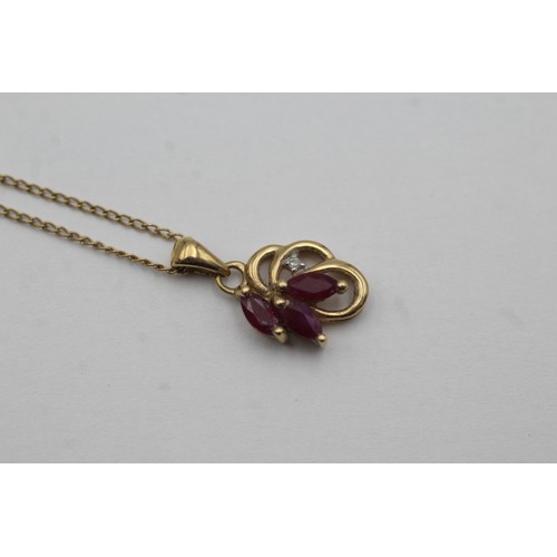 460 - 9ct gold diamond & ruby pendant necklace (1.8g)