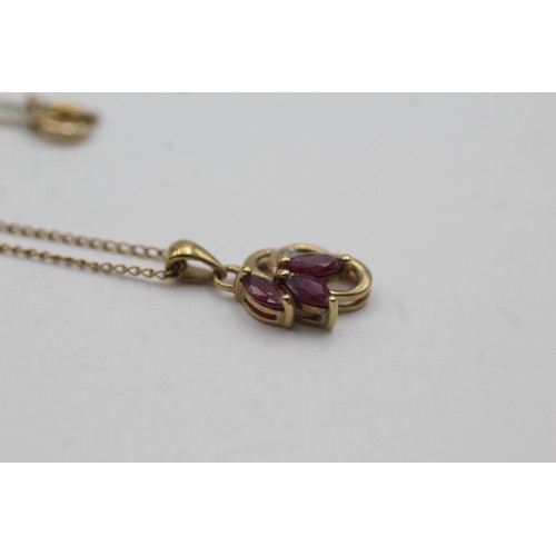 460 - 9ct gold diamond & ruby pendant necklace (1.8g)