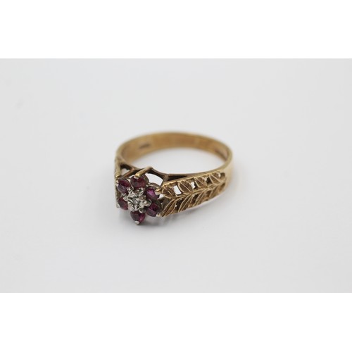 464 - 9ct gold diamond & ruby cluster ring with foliate shanks (2.6g)- SIZE N