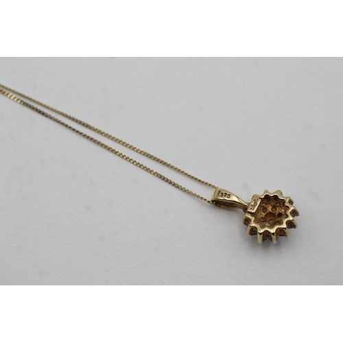 500 - 9ct gold diamond halo pendant necklace (1.2g)