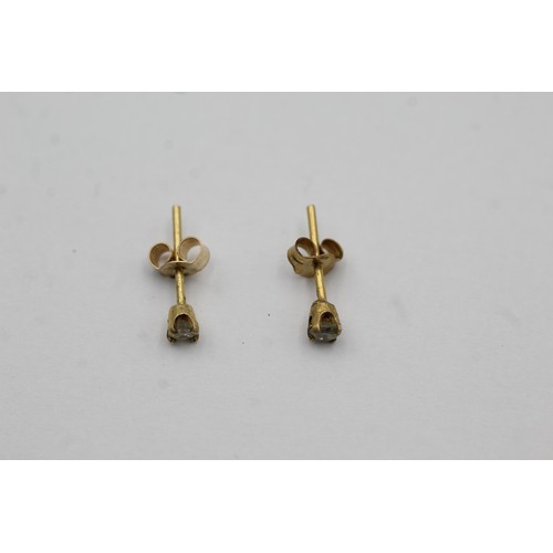 508 - 9ct gold diamond stud earrings (0.3g)