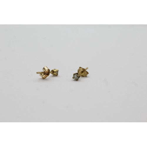 508 - 9ct gold diamond stud earrings (0.3g)