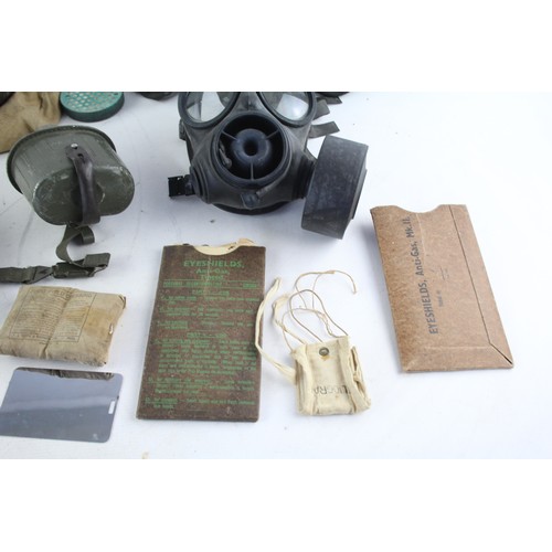 543 - Job Lot of Assorted Militaria Inc Gas Masks, Eyeshields, Flasks, Heliograph Etc