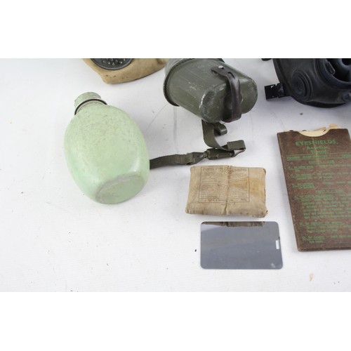 543 - Job Lot of Assorted Militaria Inc Gas Masks, Eyeshields, Flasks, Heliograph Etc