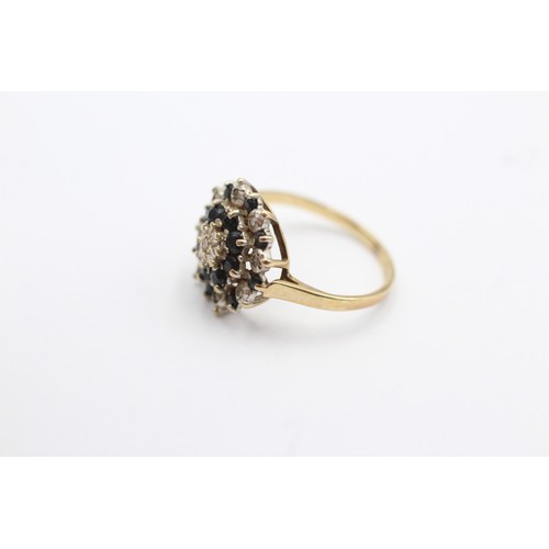 544 - 9ct gold diamond & sapphire halo ring (1.7g)- SIZE J