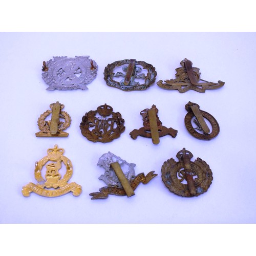 31 - 10 x METAL MILITARY CAP BADGES