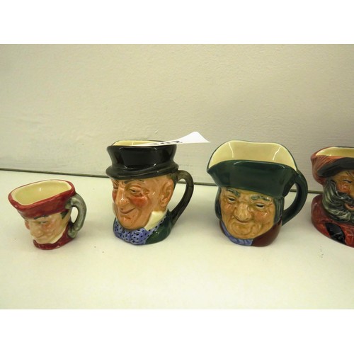 302 - FIVE VINTAGE ROYAL DOULTON TOBY JUGS and A CLAY PIPE