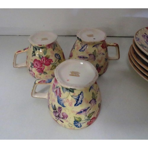 182 - WADE FLORAL DESIGN PART TEASET COMPRISING OF A TEAPOT, FIVE CUPS & SAUCERS