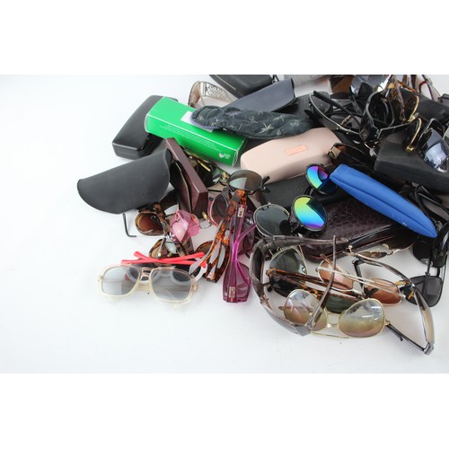 519 - 70 x Assorted SUNGLASSES Inc. Calvin Klein, Emporio Armani, Ralph Lauren Etc