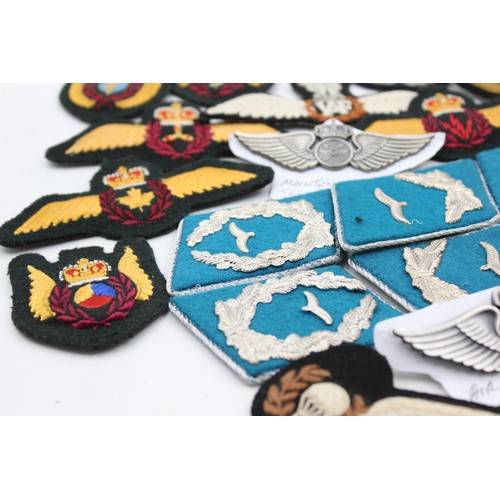 521 - 28 x Airforce Badges Inc Pilots Wings, Collar Tabs, Canadian, Saudi, Indian, Etc