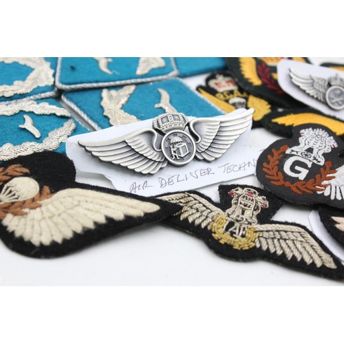 521 - 28 x Airforce Badges Inc Pilots Wings, Collar Tabs, Canadian, Saudi, Indian, Etc