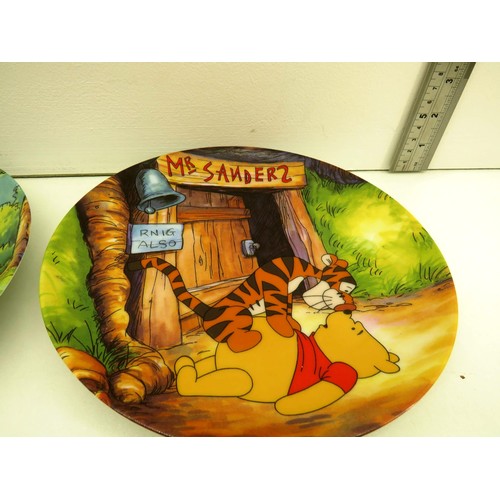 22 - COLLECTION OF DECORATIVE PLATES INCLUDES WINNIE THE POOH & THE POOH TRIO