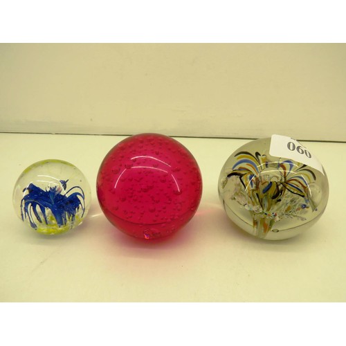 60 - THREE GLASS PAPERWEIGHTS