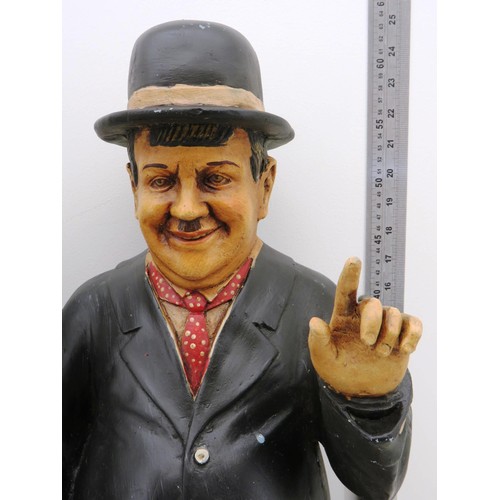 331 - LAUREL AND HARDY LARGE FIGURES ON METAL BENCH APPROXIMATE HEIGHT 25