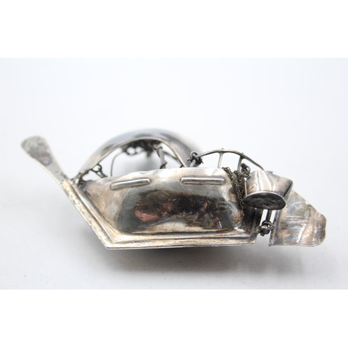 439 - Unmarked SILVER Ship Ornament with Wooden Stand (44g)