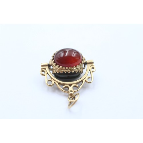 456 - 9ct gold onyx, bloodstone & carnelian swivel fob pendant (3.7g)