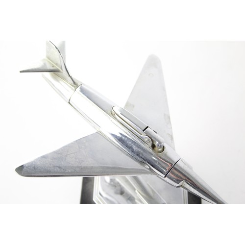 477 - 1950's Chrome Aviation Table lighter in the form of a Fighter Jet Modelled on a bakelite base