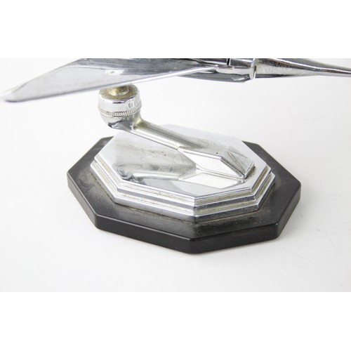 477 - 1950's Chrome Aviation Table lighter in the form of a Fighter Jet Modelled on a bakelite base