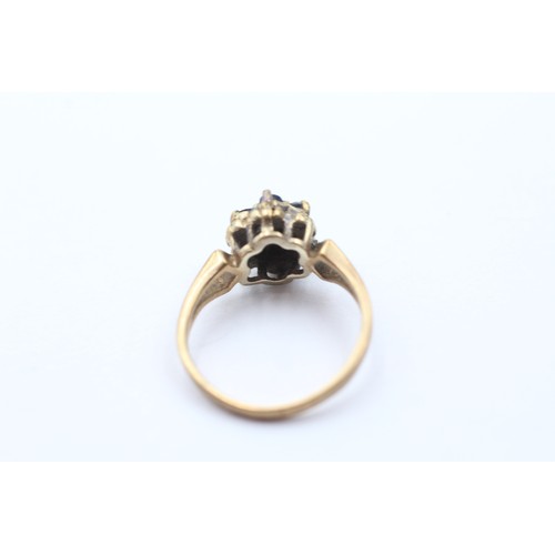 484 - 9ct gold diamond & sapphire floral cluster ring (2.6g) SIZE K