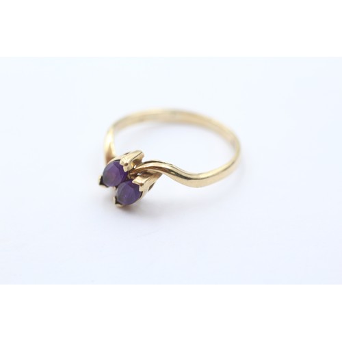 488 - 9ct gold amethyst bypass ring (1.7g) SIZE N