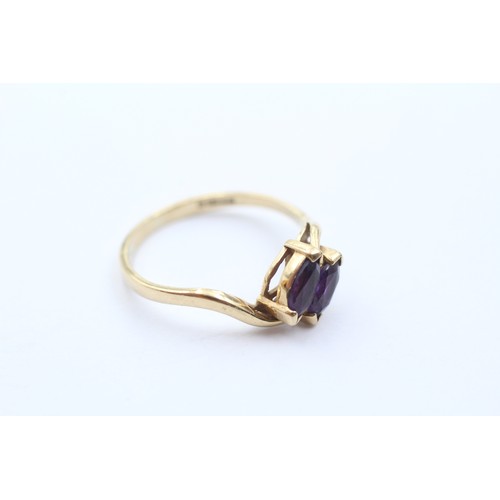 488 - 9ct gold amethyst bypass ring (1.7g) SIZE N