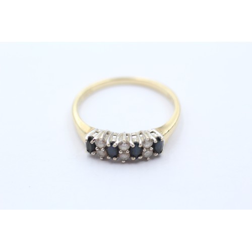 516 - 9ct gold sapphire & clear gemstone dress ring (1.7g) SIZE Q