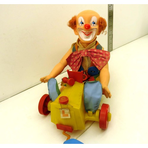 354 - VINTAGE PALITOY CLOWN TIPPY TUMBLES IN A CAR BATTERY OPERATED TOY IN VERY GOOD CONDITION