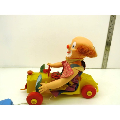 354 - VINTAGE PALITOY CLOWN TIPPY TUMBLES IN A CAR BATTERY OPERATED TOY IN VERY GOOD CONDITION