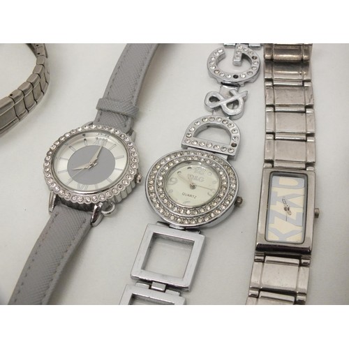 231 - SELECTION OF WATCHES INCLUDES BURBERRY, DOG, DKNY AND ROTARY